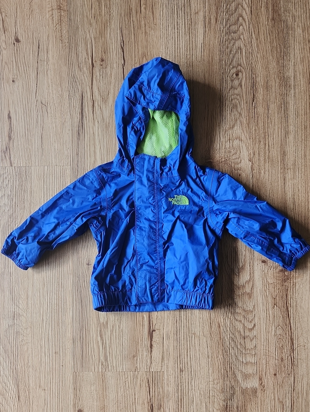The North Face Baby - Blue Hooded Rain Jacket with Lime Accent